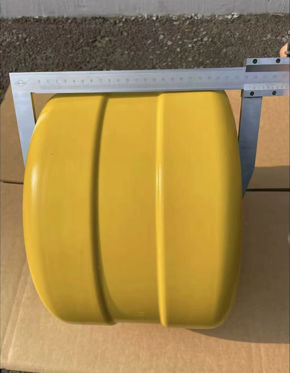 Caliper checking the profile and size of a yellow roller barrier component