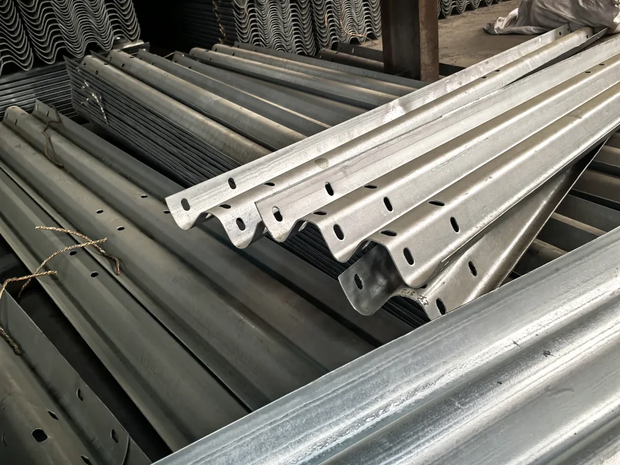 Thrie-beam section surface and mounting holes