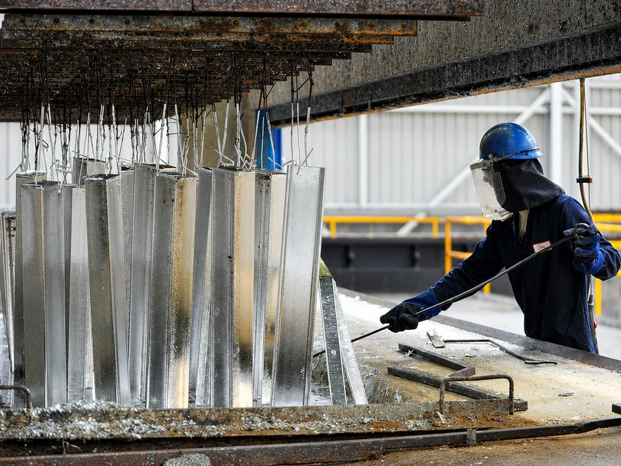 Guardrail galvanizing process shown in supplied factory imagery